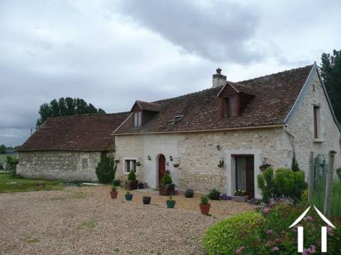 A RENOVATED BARN AND HOUSE