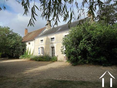 A LARGE CONVERTED FARMHOUSE WITH IMPRESSIVE OUTBUILDINGS