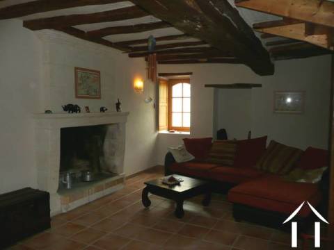 The lounge, located laneside - this is the oldest part of the property and a feature stone fireplace (which works!). 
