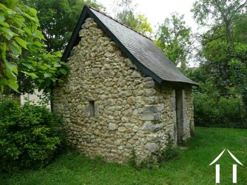 Re-roofed, this small outbuilding provides an ideal storage area for garden furniture etc. 