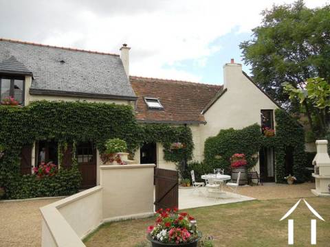 The house faces south and looks up the escarpment to the forest. It is located in a quiet hamlet (approx 4 houses) outside of a village that has all the basic commerce including a large supermarket. 