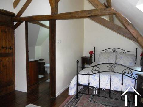 The master bedroom with ensuite shower room. 