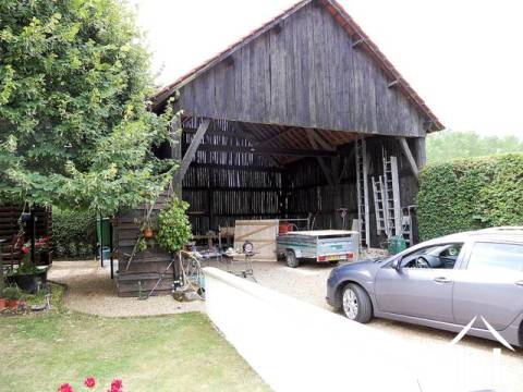 The open hanger is used mainly as a covered parking area. 