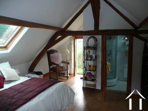 The master bedroom in the gîte (with ensuite shower / washbasin & WC). 
