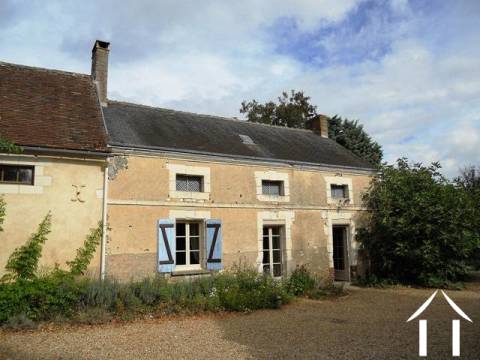 Originally a large farmhouse, the property has been converted over a number of years. Its style is reflective of the region with both an ardoise slate and terra cotta tile roof. All the buildings are constructed of the local tuffeau limestone.    