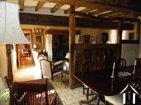 The lounge/dining room has a large feature fireplace, exposed stone walls, oak beams and lots of features. This room (over 40m2) also has the staircase which gives access to the first floor. Off this area is a downstairs WC and, separately, a double bedroom (with ensuite shower room). 