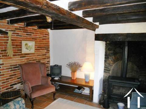 The lounge area of the gîte (with wood burning stove included). 