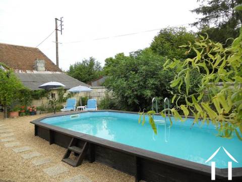 A landscaped garden with a number of sun terraces all centred around the swimming pool. 