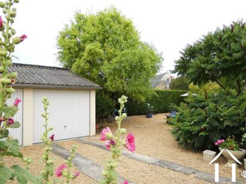 This picture shows the access to the plot (picture taken from the gates). There is a good parking area plus a double garage. 