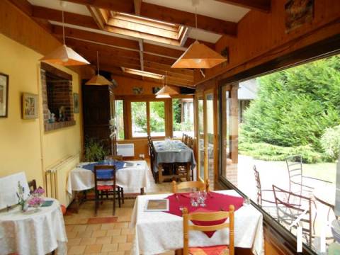 This is the guest breakfast and dining room, which overlooks the grounds and the two lakes. 