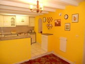 The fitted kitchen also includes a good size dining area.