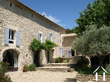 Natural stone mas with outbuildings