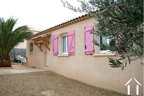Single storey villa with swimming pool .