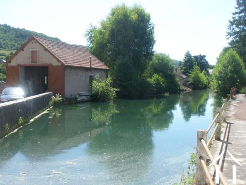 Garage and River House