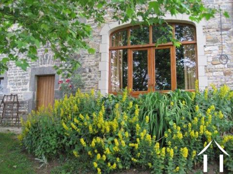 Achterkant zitkamer, deuren onbreekbaar glas
