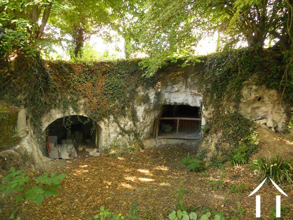 The surprise: two of the three cave workings located in the grounds. One of these is used as the wine cellar !