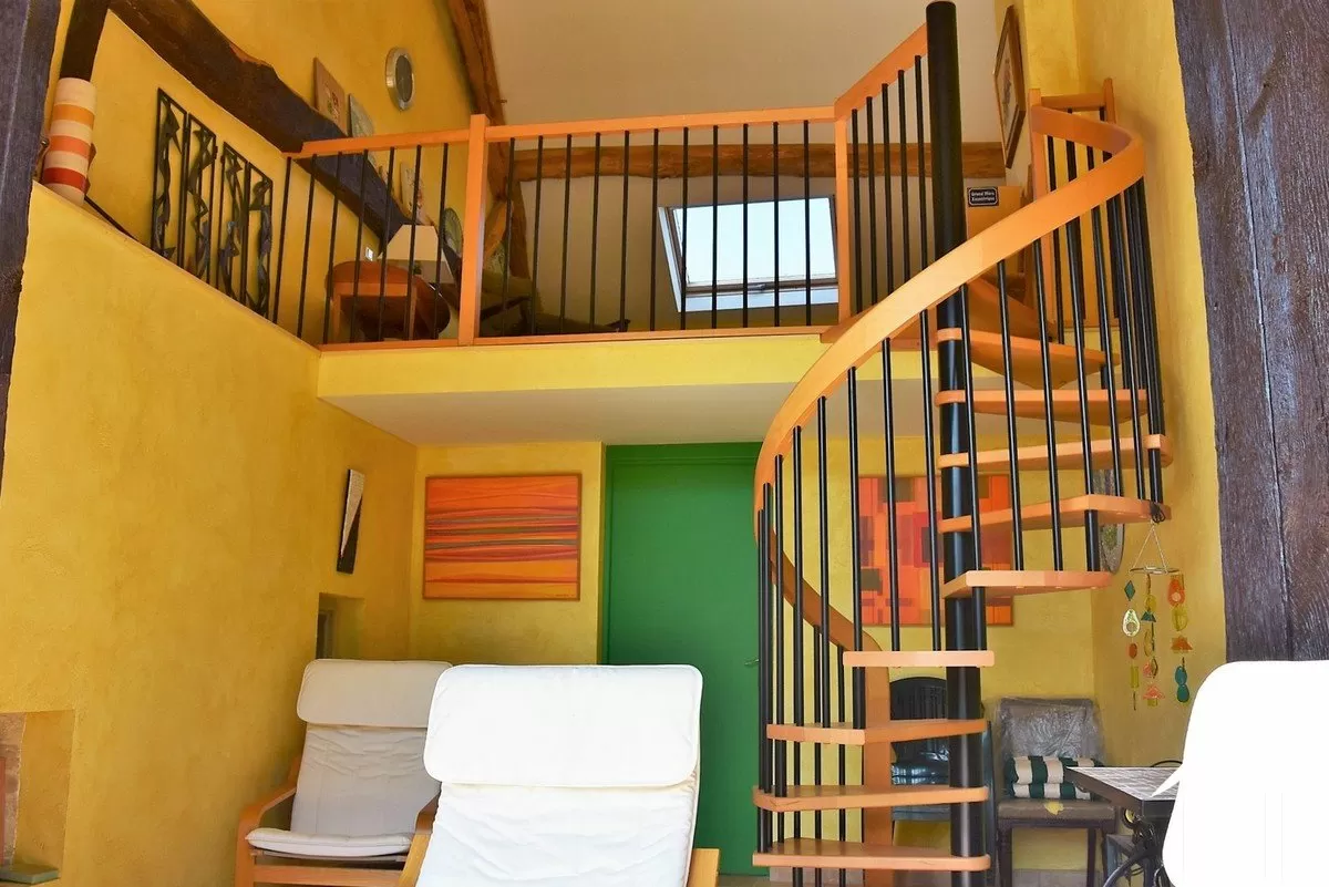 renovated barn with leisure area and mezzanine