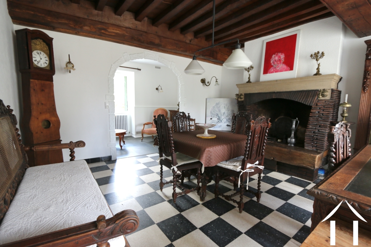 House 1: Living room with reading room in the back