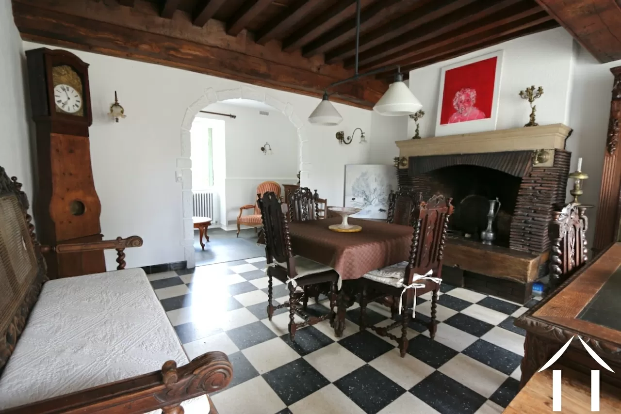 House 1: Living room with reading room in the back