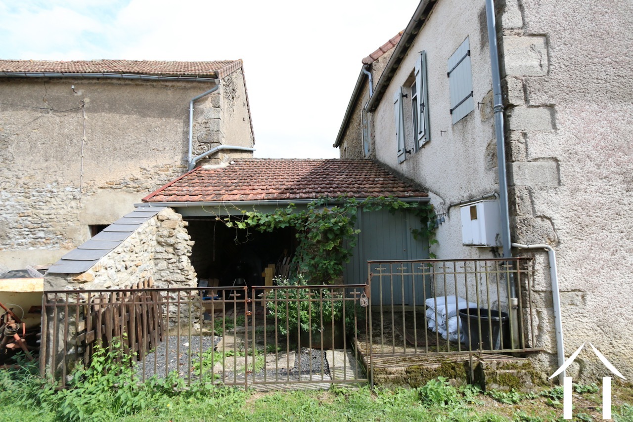 Back of the house with access to shed and workshop that leads to the laundryroom