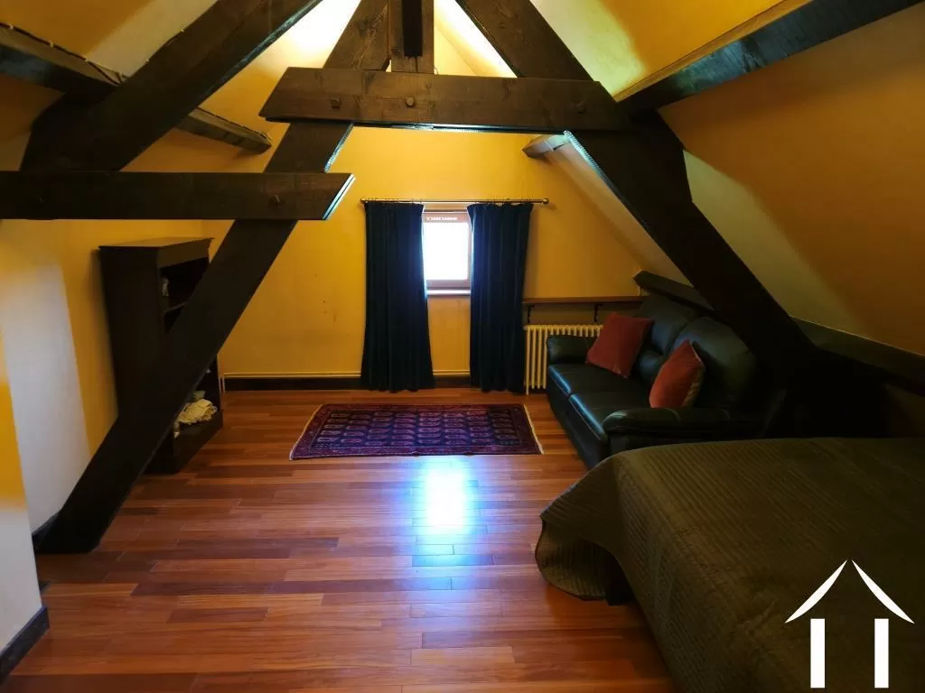 Bedroom with exposed beams