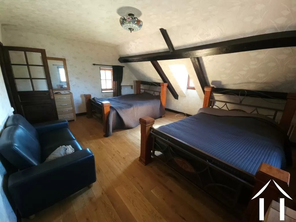 Master bedroom with exposed beams