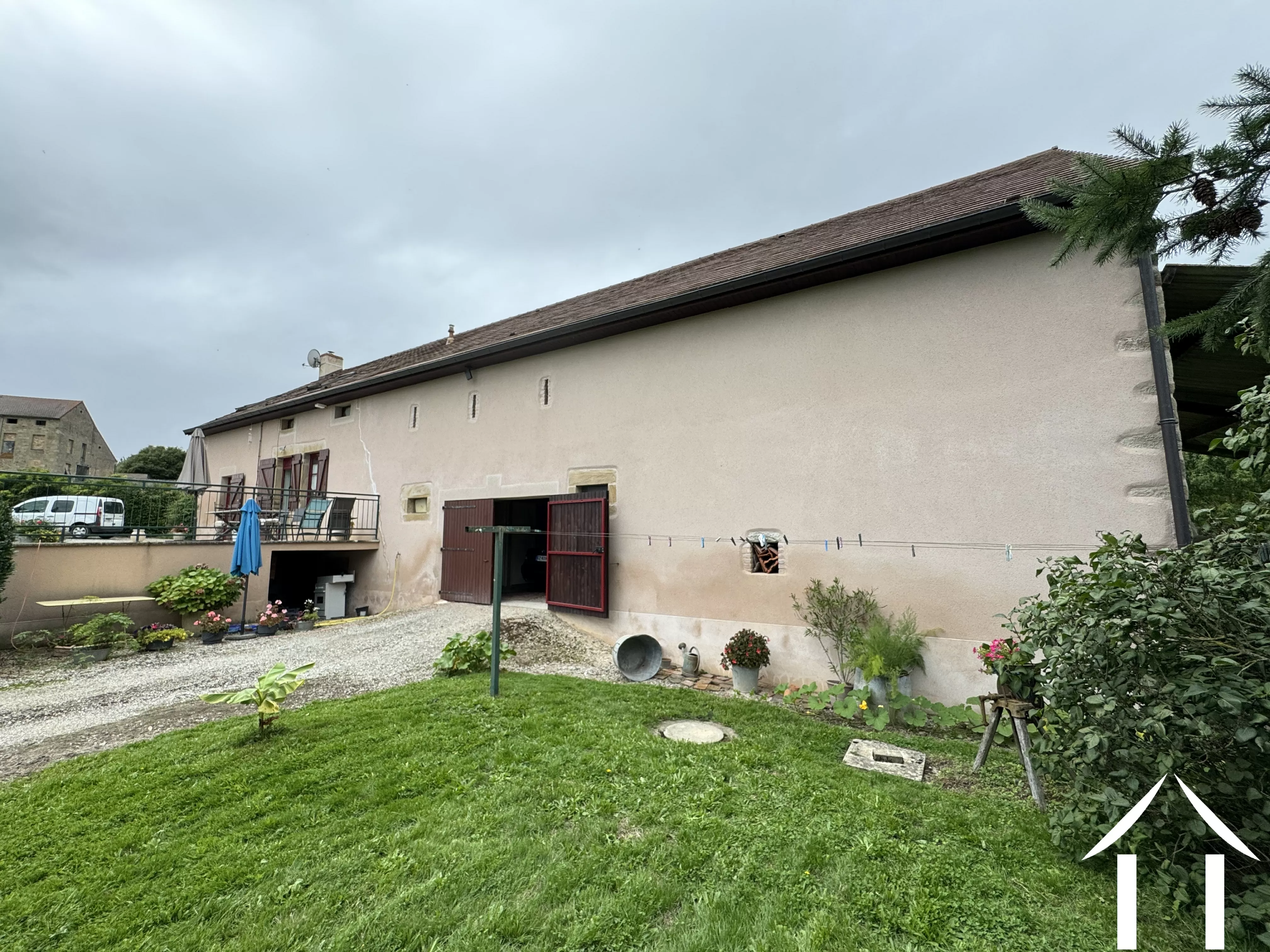 Achterkant huis met fosse septique