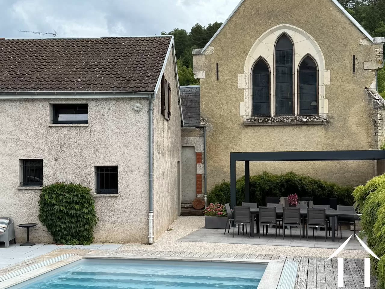 Pergola in front of old chapel