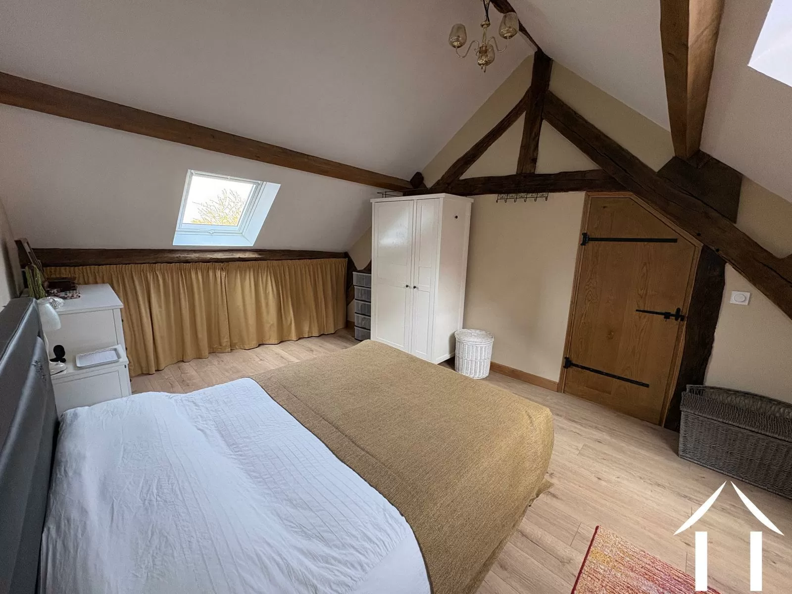 Master bedroom with exposed beams