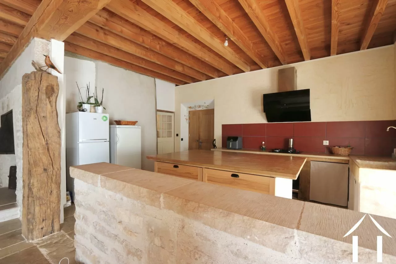 Fitted kitchen open to the living room