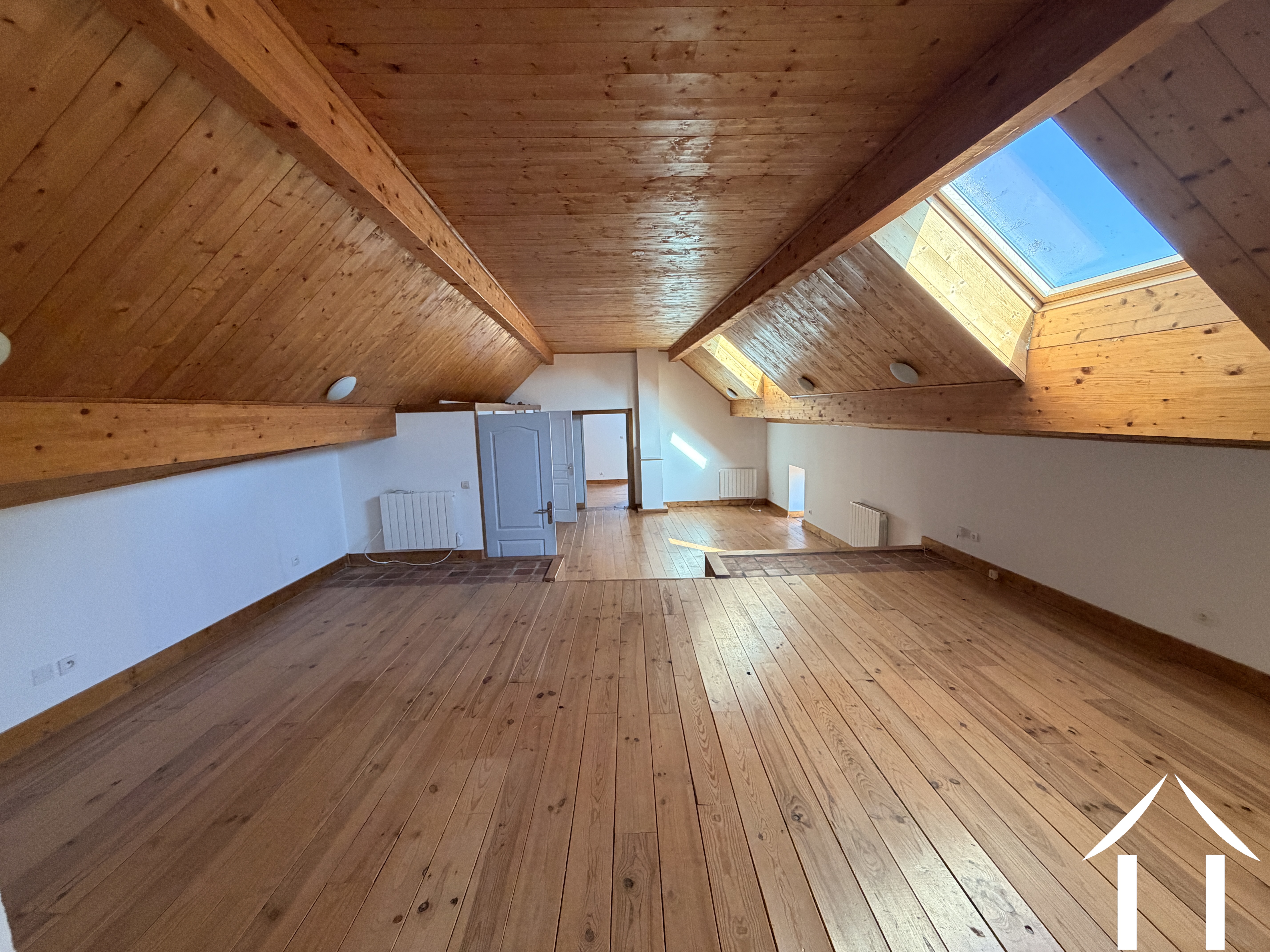Huge middle part on first floor with at your left separate bathroom and WC