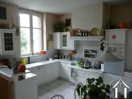 The fitted kitchen (19m2) - the window overlooks the courtyard and garden.
