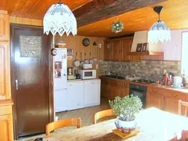 This shows part of the fitted kitchen with dining area
