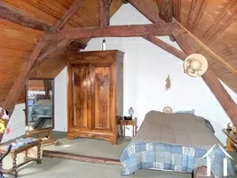 This shows part of the large bedroom on the first floor