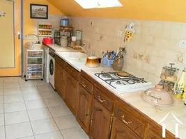 This shows one of the two fitted kitchens