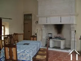 The manor house dining room has many of the original character features along with tasteful restoration of the walls, floors and windows.