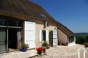 Cobble courtyard in front of kitchen and living room