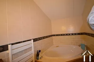 separate bathroom with double washbasin