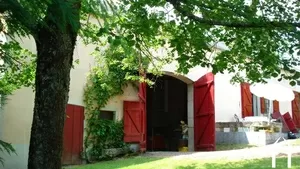 entrance to barn, front of house