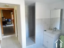 bathroom with sink and shower