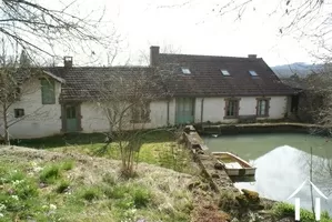 Rear of property with pond