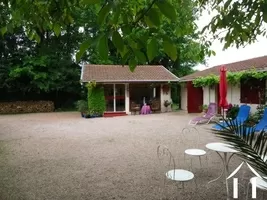 courtyard with the guest living room and guest room "Le Soleil"