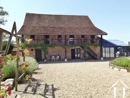 Barn with on first floor apartments, and ground floor owners house