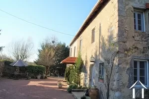 House with courtyard and well maintained gardens