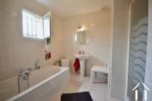 Bathroom with bath and shower