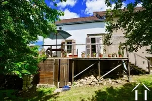 terrace deck looking onto fruit tree garden, accessed from apartment.