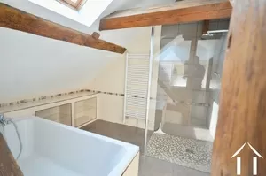 shower and bath in bathroom upstairs