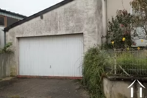 Spacious garage next to the house