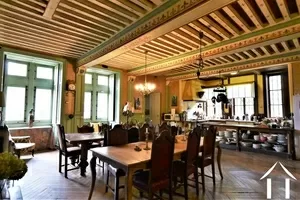 Dining room with painted beamed ceilings