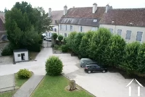 Car parking area with bike shed